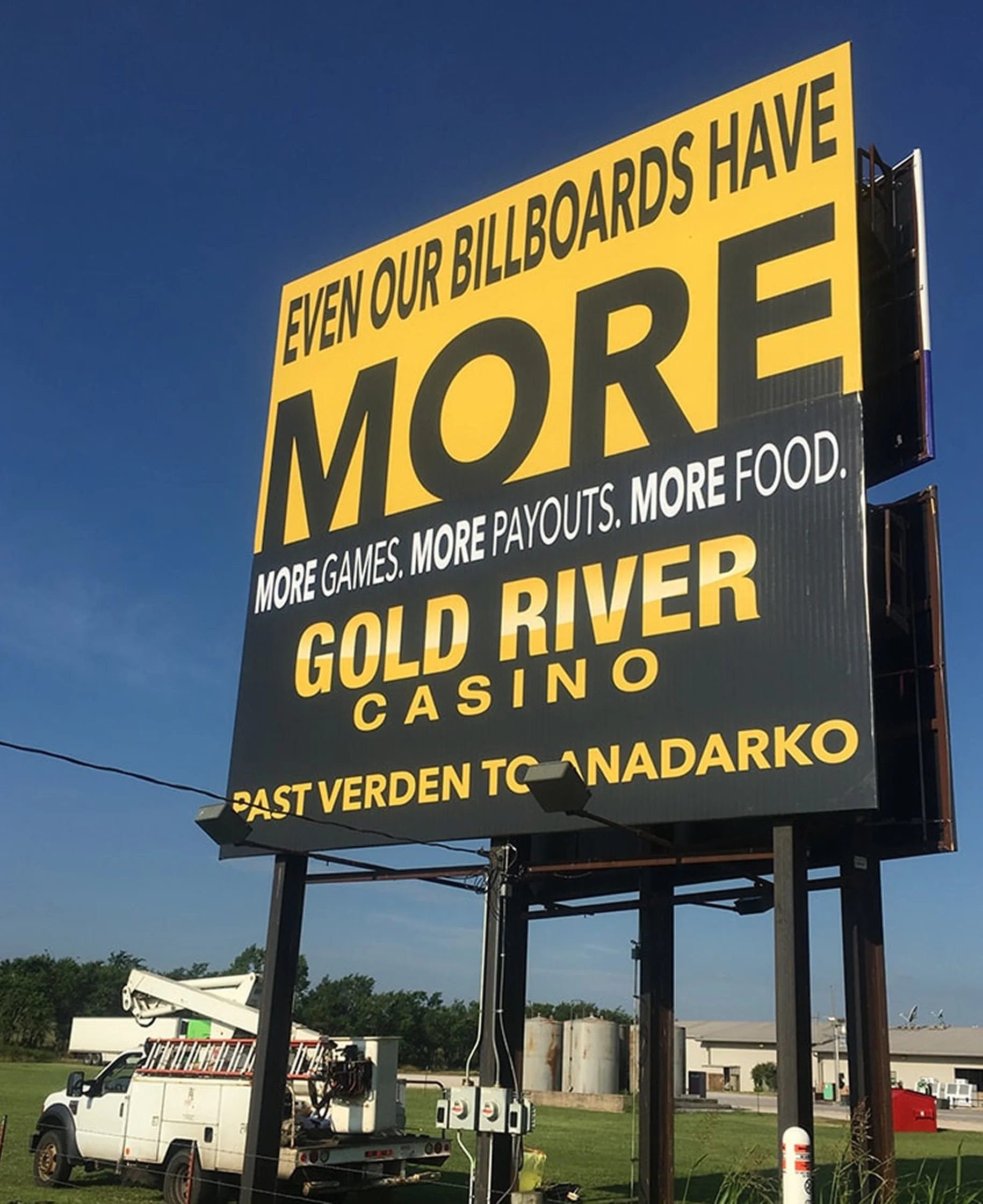 Casino billboard with promotional message.